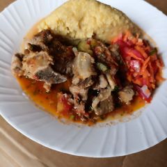Yellow ugali with beef A picture of Yellow ugali with beef.