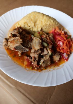 A picture of Yellow ugali with beef.