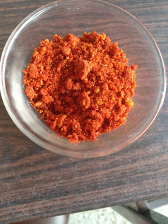A picture of Vada pav chutney (dry powder).