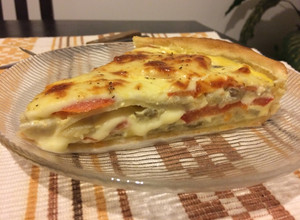 Una foto de Tarta de berenjenas y tomate 🍅