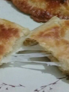Una foto de Empanadas de queso al horno