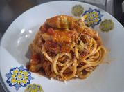 Una foto di pasta pomodoro carciofo