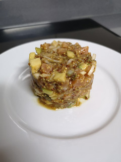 Una foto de Tartar de salmón ahumado