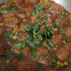 A picture of Matar or Moong dal Pakode ki Sabzi.