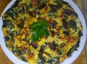 Una foto de Tortilla de kale o col crespa