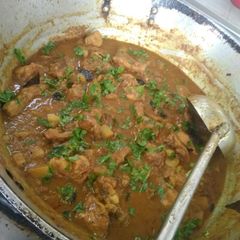 A picture of Murgir jhol(chicken curry).