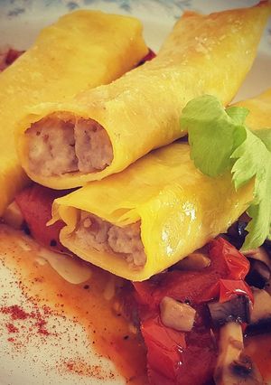 Foto di Cannelloni ai cardoncelli su salsa di funghi e pomodorini