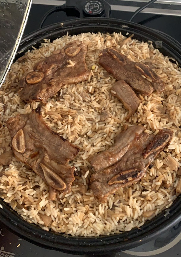 Una foto de Arroz con setas y churrasco