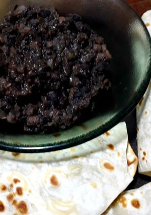 Una foto de Sofrito de porotos negros