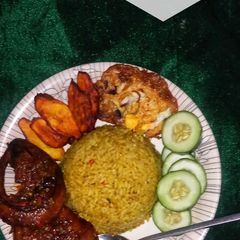 A picture of Curry jollof rice.