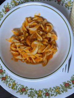 A picture of Pasta in red sauce.