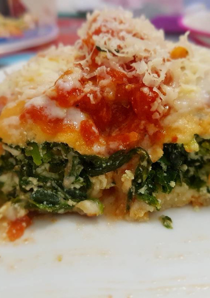 Una foto de Canelones de espinaca y ricotta