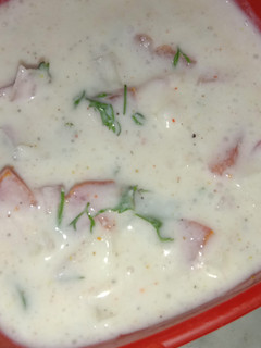 A picture of Cucumber tomato Raita.