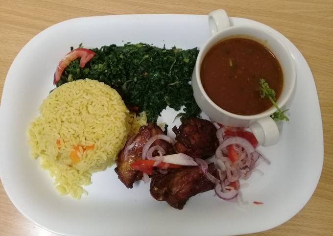 Steamed Tumeric Rice,pan grilled chicken, Fried spinach and Mixed Vegetable gravy