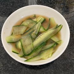 A picture of Ribbon pickled cucumbers.