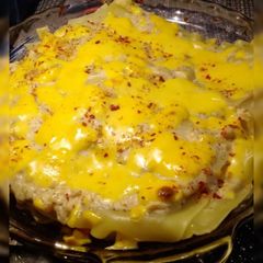 A picture of 3 layered Lasagna.