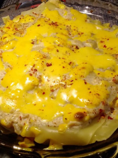 A picture of 3 layered Lasagna.