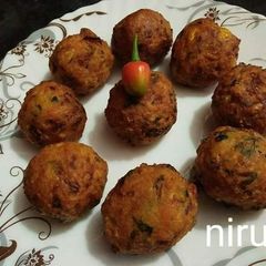 A picture of Veggies and Rice masala balls.