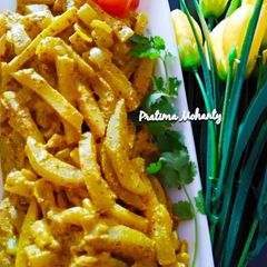 A picture of Lau Besara(Bottle Gourd with mustard-poppy seeds paste).