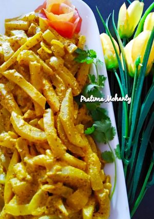 A picture of Lau Besara(Bottle Gourd with mustard-poppy seeds paste).
