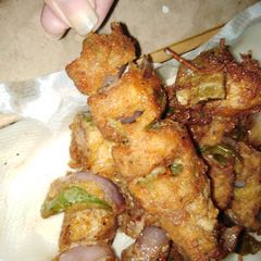 A picture of Chicken sticks restaurant style.