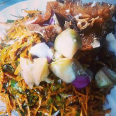 A picture of Stockfish and african salad.