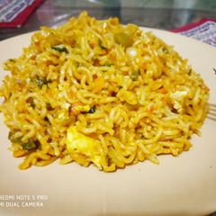 A picture of Maggi with lots of veggies.