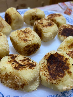 Una foto de Bolitas de patata y parmesano