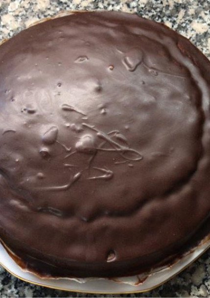 Una foto de Brownie con cobertura de chocolate