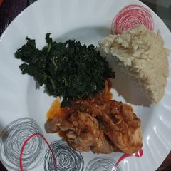 Chicken,Mchicha With Ugali A picture of Chicken,Mchicha With Ugali.