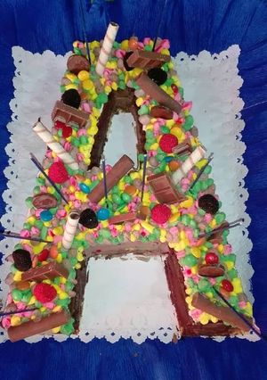 Una foto de Torta en forma de letra