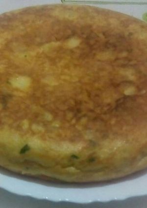 Foto principal de Tortilla de patata con ajo y perejil 