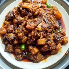 A picture of Hilsha fish vegetables curry.