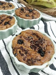 A picture of Easy Banana bread with cocoa nibs and blueberries.