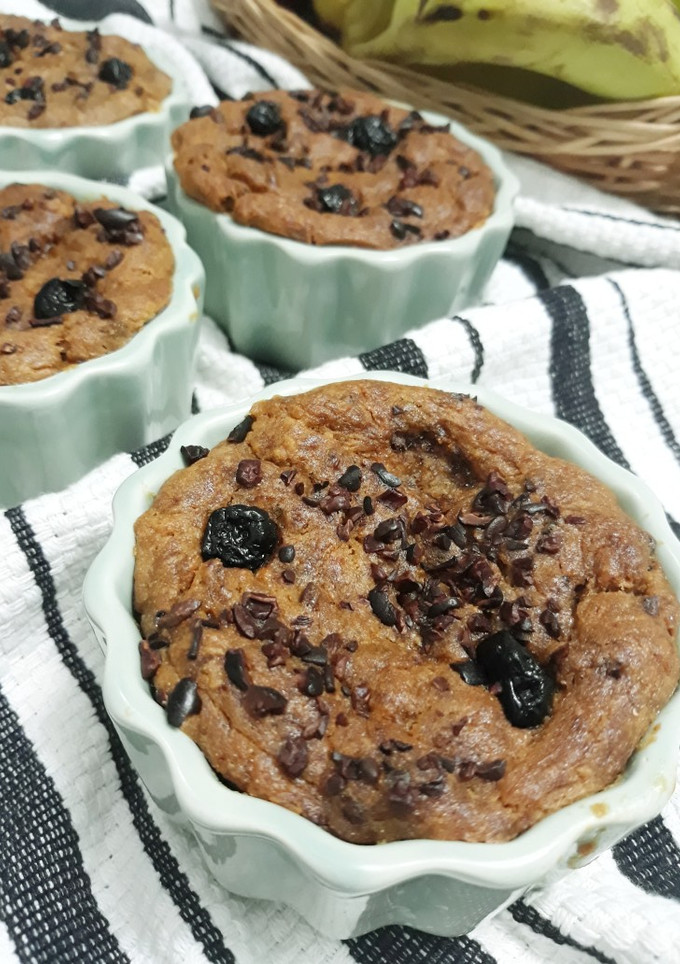 A picture of Easy Banana bread with cocoa nibs and blueberries.