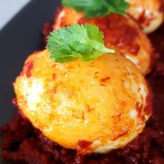 Eggs in Red Hot Chilli Sauce A picture of Eggs in Red Hot Chilli Sauce.