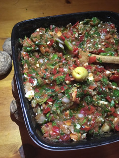 A picture of Acili Ezme (Spicy vegetable salad).