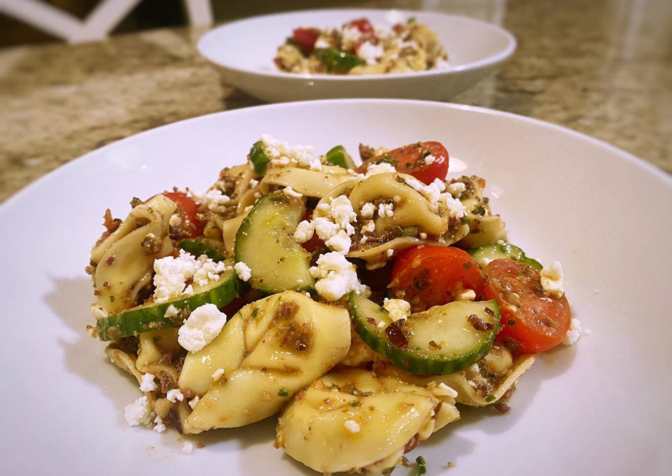 Tortellini olive tapenade with marinated tomatoes and cucumbers