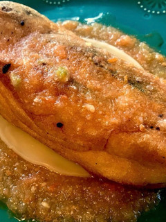 A picture of Chile’s Relleno’s and Ranchero Sauce.
