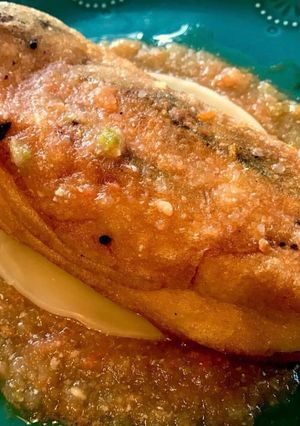 A picture of Chile’s Relleno’s and Ranchero Sauce.