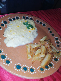 Una foto de Pechuga de pollo en crema de elote