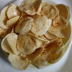 A picture of Fried  Aalu chips.