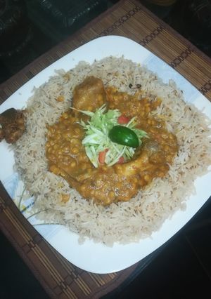 A picture of Dal gosht with Zeera rice.