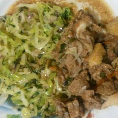 A picture of Stewed beef and steamed cabbages.