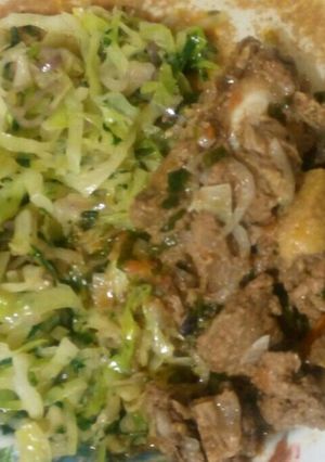 A picture of Stewed beef and steamed cabbages.