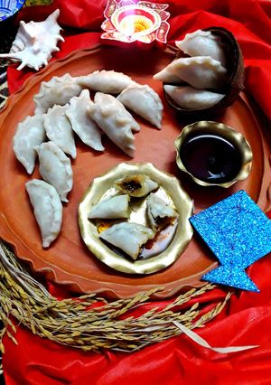 ভাপা পুলি পিঠা (bhapa puli pithe recipe in bengali) রেসিপির প্রধান ছবি