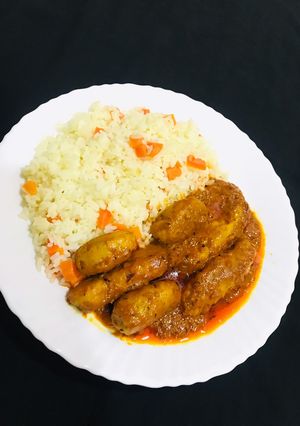 A picture of White rice with chicken koofta.