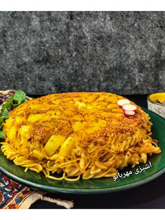 عکسی از دستور تهدیگ سیب زمینی کنجدی