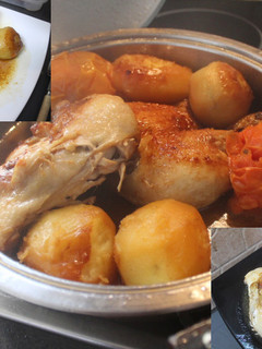 Una foto de Contra muslos de pollo asados con patatas y tomates