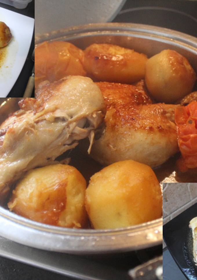 Una foto de Contra muslos de pollo asados con patatas y tomates